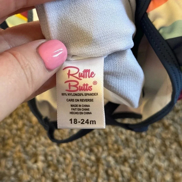 Ruffle Butts One Piece in Sunset Strip Scallop Peplum - Picture 2 of 5